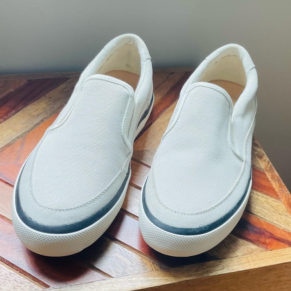New, never worn Clarks slip on canvas sneakers. Natural/Off-white. Size 10